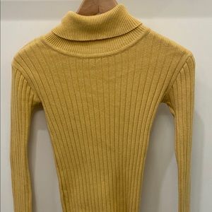 Yellow turtle neck sweater